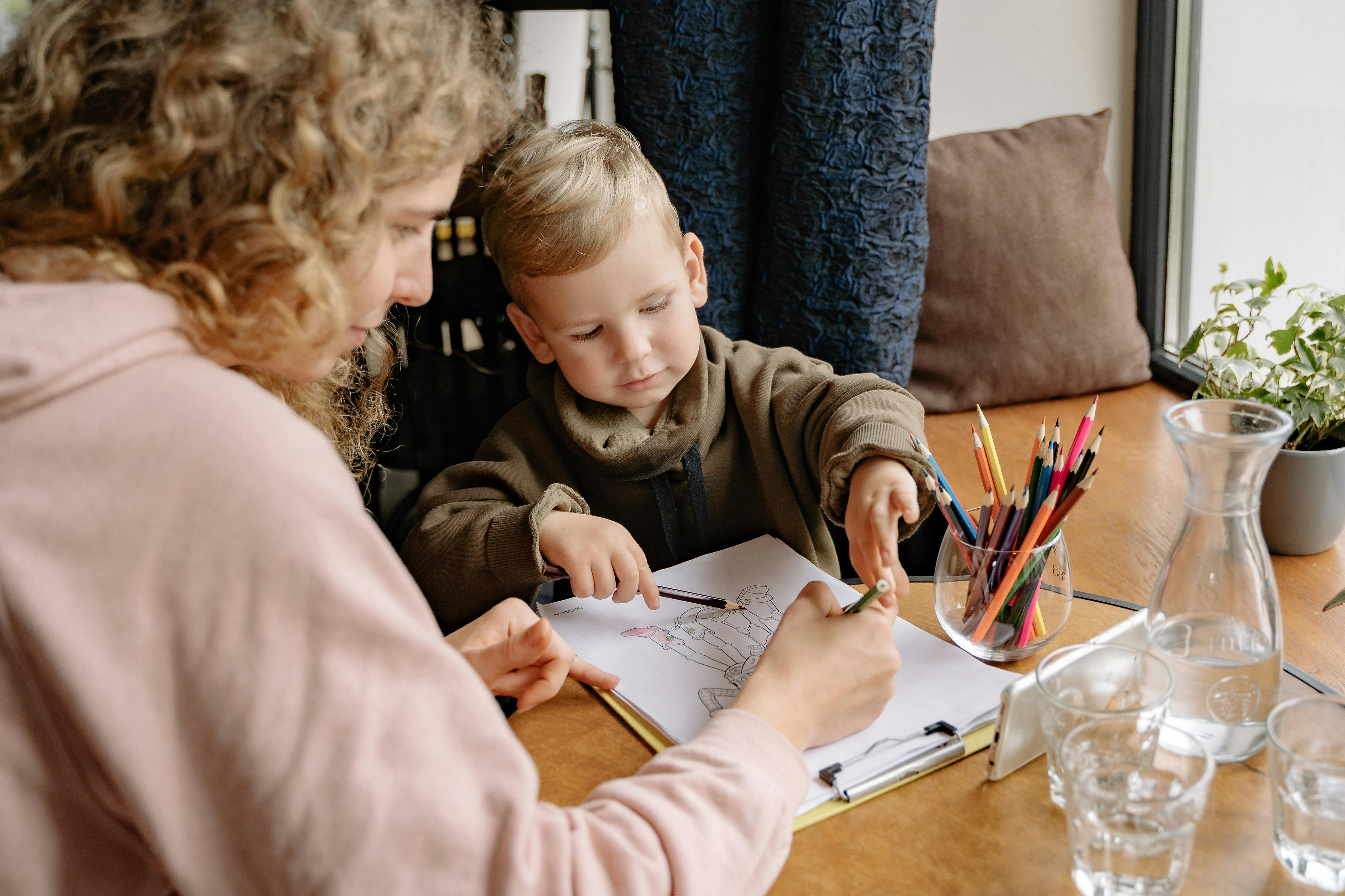 Parent and child coloring together